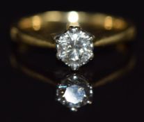 An 18ct gold ring set with a round cut diamond of approximately 0.5ct, size N, 4.1g