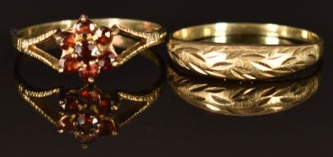 A 9ct gold ring set with garnets (size U, 1.2g) and a 9ct gold ring, size U, 1.6g