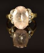 A 9ct gold ring set with morganite and diamonds, size O/P, 4g