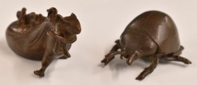 Two Japanese bronzes, one a mouse carrying a sack with creatures on it the other a beetle, both
