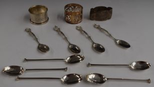 Five hallmarked silver seal top spoons, hallmarked silver napkin ring, four teaspoons marked 800 and