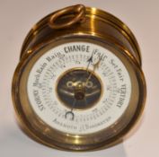 French brass aneroid travel dial barometer, the white chapter ring dial with black contrasting