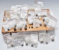 A collection of musket, fowling and pistol balls, many in annotated packets with sizes