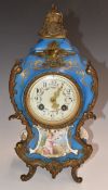 19thC French mantel clock in champlevé enamel case with ormolu mounts, decorated with putto and