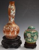 19thC Chinese ginger jar, Japanese Kutani vase and two hardwood stands, tallest 31cm