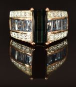 An 18k rose gold ring set with tourmaline, aquamarines and diamonds, size L/M, 10.5g