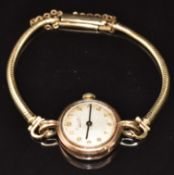 Everite 9ct gold ladies wristwatch with blued hands, gold Arabic numerals, silver dial and 17