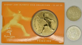 1998 £1 coins comprising a silver piedfort and a standard issue, early strikes produced for the