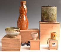 A collection of Japanese studio pottery tea ceremony ware, mainly Ohi ware by Choamu Ohi, in
