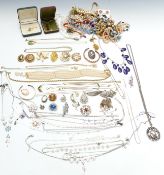 A collection of costume jewellery including vintage brooches, vintage necklaces, silver filigree
