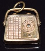 A 9ct gold radio charm, 1.4g