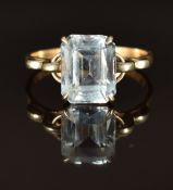 A 9ct gold ring set with emerald cut blue topaz, size O/P, 2.4g