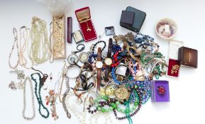 A collection of jewellery including pearl necklaces, silver chain, malachite necklace, rose quartz