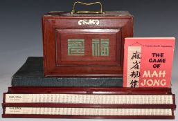 A brass bound Mah Jong set