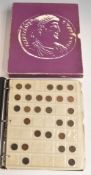 An album of UK coins including silver
