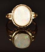 A 9ct gold ring set with an opal, size P, 3.4g