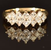A 14ct gold ring set with 16 princess cut diamonds, total diamond weight approximately 0.96cts, 3.