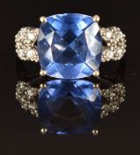 A 9ct gold ring set with topaz and white sapphires, size N, 3.6g