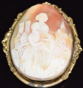 Victorian brooch set with a large cameo of a mother and child overlooking a city, 5.5 x 6cm