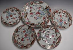 Chinese 19thC famille rose charger and four plates decorated with flowers, diameter of largest 32cm