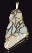 A 9ct pendant set with opal boulder, 14.1g, 6.5cm x 2.7cm