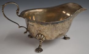 Mappin & Webb George VI hallmarked silver sauce boat raised on three feet, Shefffield 1940, length