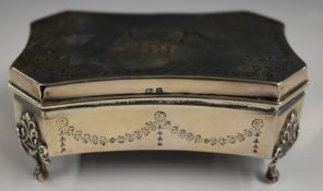George V hallmarked silver dressing table casket, with engraved neoclassical decoration, raised on