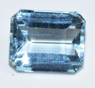 A loose emerald cut aquamarine measuring approximately 6.6ct