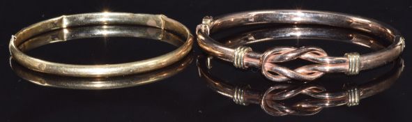A 9ct gold knot bangle and a 9ct gold bangle, 15.1g