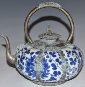 Chinese blue and white lobed porcelain teapot with metal mounts, H16cm