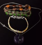 An 18ct gold bracelet set with amber, a beaded opal bracelet, agate bracelet, and fluorite pendant