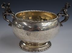 Edward VII Mappin and Webb hallmarked silver two handled bowl with figural handles, London 1909,