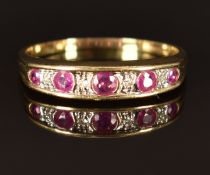 A 9ct gold ring set with rubies and diamonds, size R/S, 1.9g