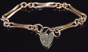 A 9ct rose gold bracelet made up of elongated and curb links, 12.2g