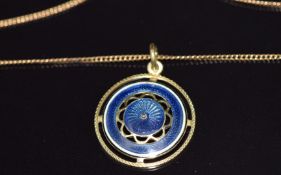 Edwardian 15ct gold pendant set with blue guilloché enamel (2.8g, 2.1cm) on a 9ct gold chain, 2.2g