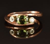 A 9ct rose gold ring set with tourmaline and diamonds, size M, 4.1g