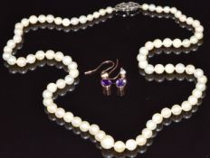 A pair of rose gold earrings set with an amethyst and opal to each and a single strand of cultured