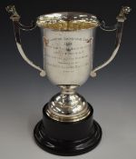 George V hallmarked silver twin handled trophy cup with lion mask handles, inscribed for the