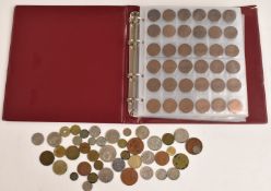 An amateur coin collection contained in an album, comprising UK and overseas examples, Queen
