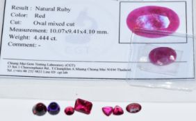 A loose oval natural ruby measuring approximately 4.4ct, synthetic rubies, amethyst, etc
