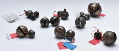 A collection of antique Crotal / Rumbler bells, 17th-19thC in brass, iron and bronze, largest