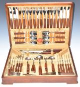 Retro six place setting canteen of Monogram Pagwood cutlery, case W46.5cm