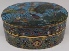 A 19thC Chinese oval covered cloisonné box decorated with Mandarin ducks, flowers and foliage, W10cm