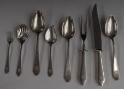 Set of white metal cutlery comprising three table spoons, two serving spoons, pickle forks and