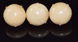 French 18ct gold brooch set with three agate pebbles, length 5cm