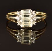 A 9k gold ring set with quartz and zircons, size T, 2.6g