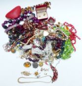 A collection of costume jewellery including vintage beads, spider brooch, Sarah Coventry brooch,