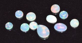 Eleven loose opals, measuring a total of 2.2cts