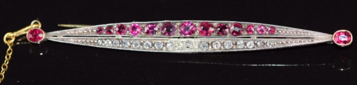 Victorian brooch of elongated boat shape set with diamonds and rubies, each end set with a further