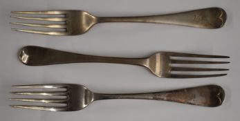 Three Old English pattern hallmarked silver table forks including a Georgian example, length 20.5cm,